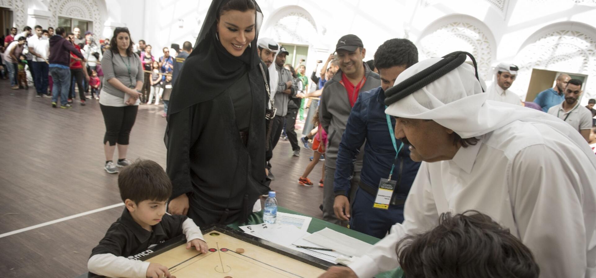 HH Sheikh Hamad Bin Khalifa Al Thani, the father Amir, and HH Sheika Moza Bint Nasser participate in National Sport Day at Qatar Foundation