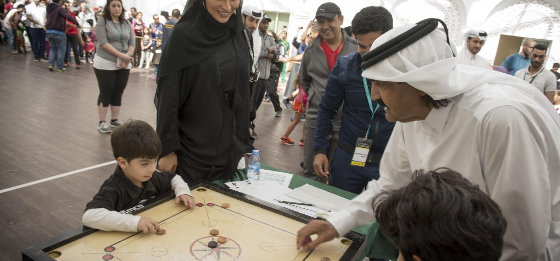 HH Sheikh Hamad Bin Khalifa Al Thani, the father Amir, and HH Sheika Moza Bint Nasser participate in National Sport Day at Qatar Foundation