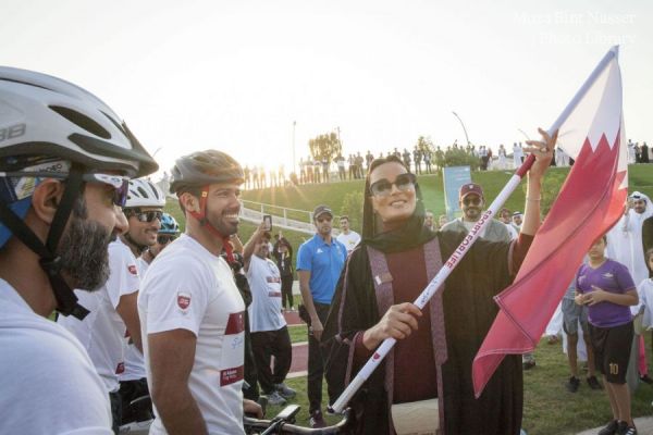 HH Sheikha Moza participates in Al Adaam Flag Relay at Education City